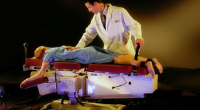 This is a picture of Cox Technic chiropratic spinal manipulation as performed at Satterwhite Chiropractic.