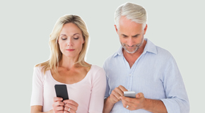 Oxford couple using smartphones