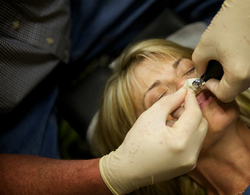 Blond woman received Cranial Facial Release procedure